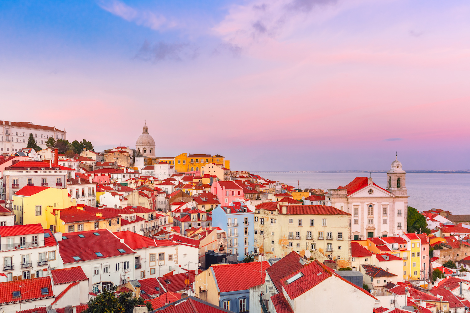 red rooftops of a town on the coast of Lisbon, Portugal