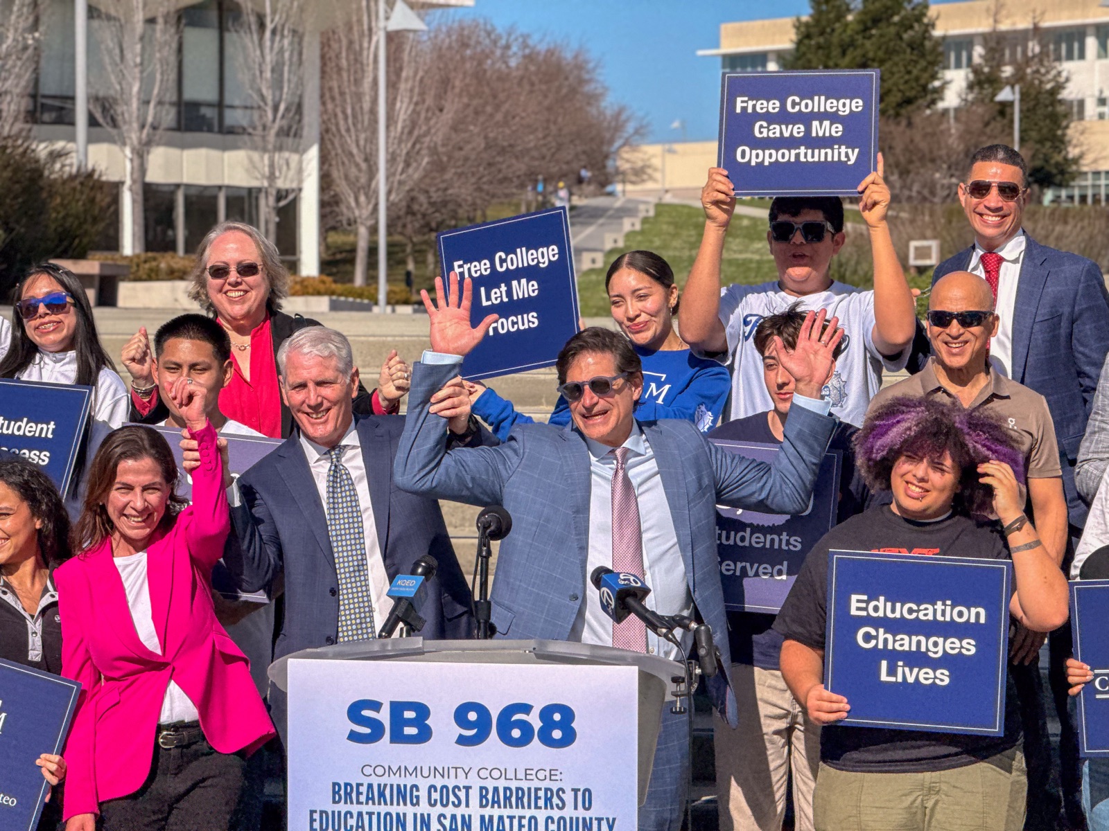 State Senator Josh Becker, Assemblymember Diane Papan and SMCCCD Trustee John Pimentel celebrate the introduction of Senate Bill 968